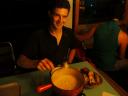 Seth with the huge pot of fondue